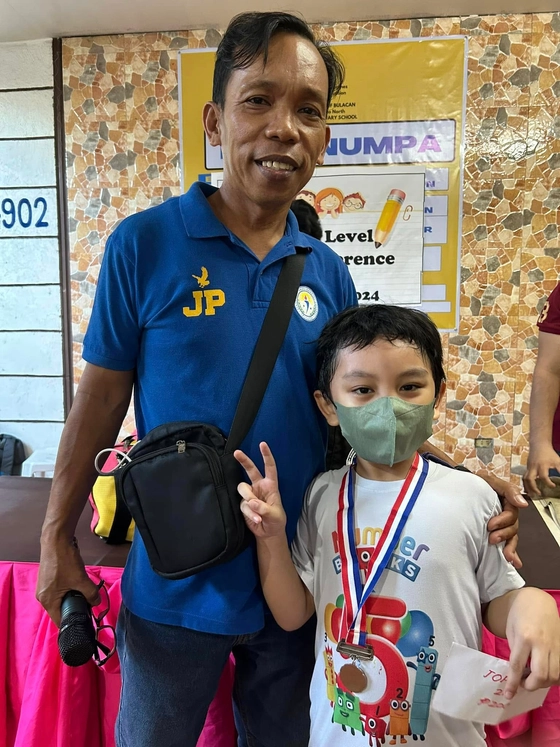 Marius with his sparring coach, Coach Joie Presente of Caloocan