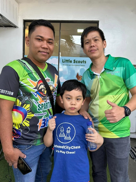 Marius with his Chess Castle Coaches, Coach Renie and Coach Ice