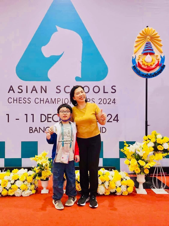 Marius with EDSCI principal, Mrs. Canlas
