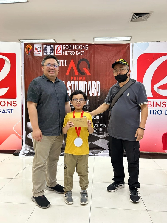 Marius with Attorney Alegre and FM Ibanez at AQ Prime Chess Tournament