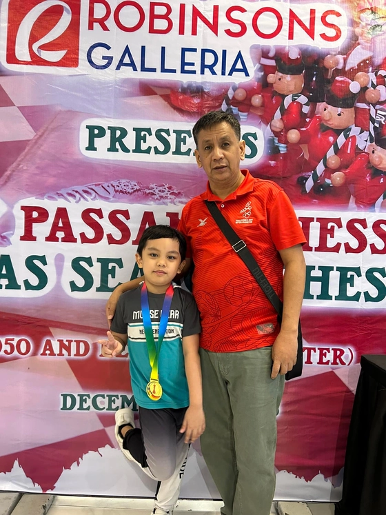 Marius with Sir Alexander Dinoy